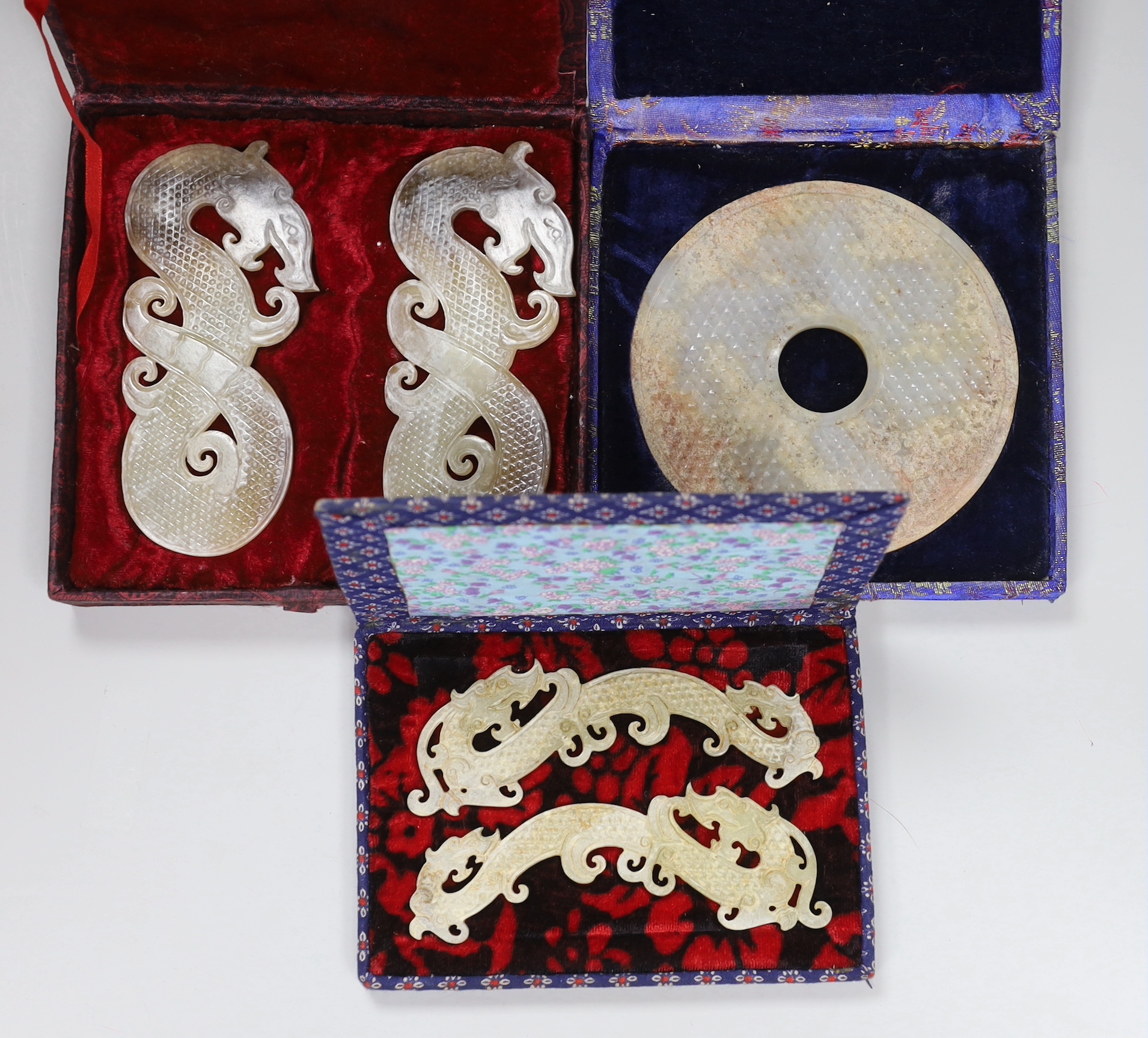 Three cased Chinese archaistic jades